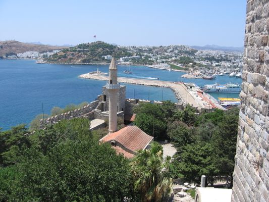 View on mosque, breakwater, marina and part of the city from castle of St.Peter in Bodrum, Turkey. | Bodrum in Turkey