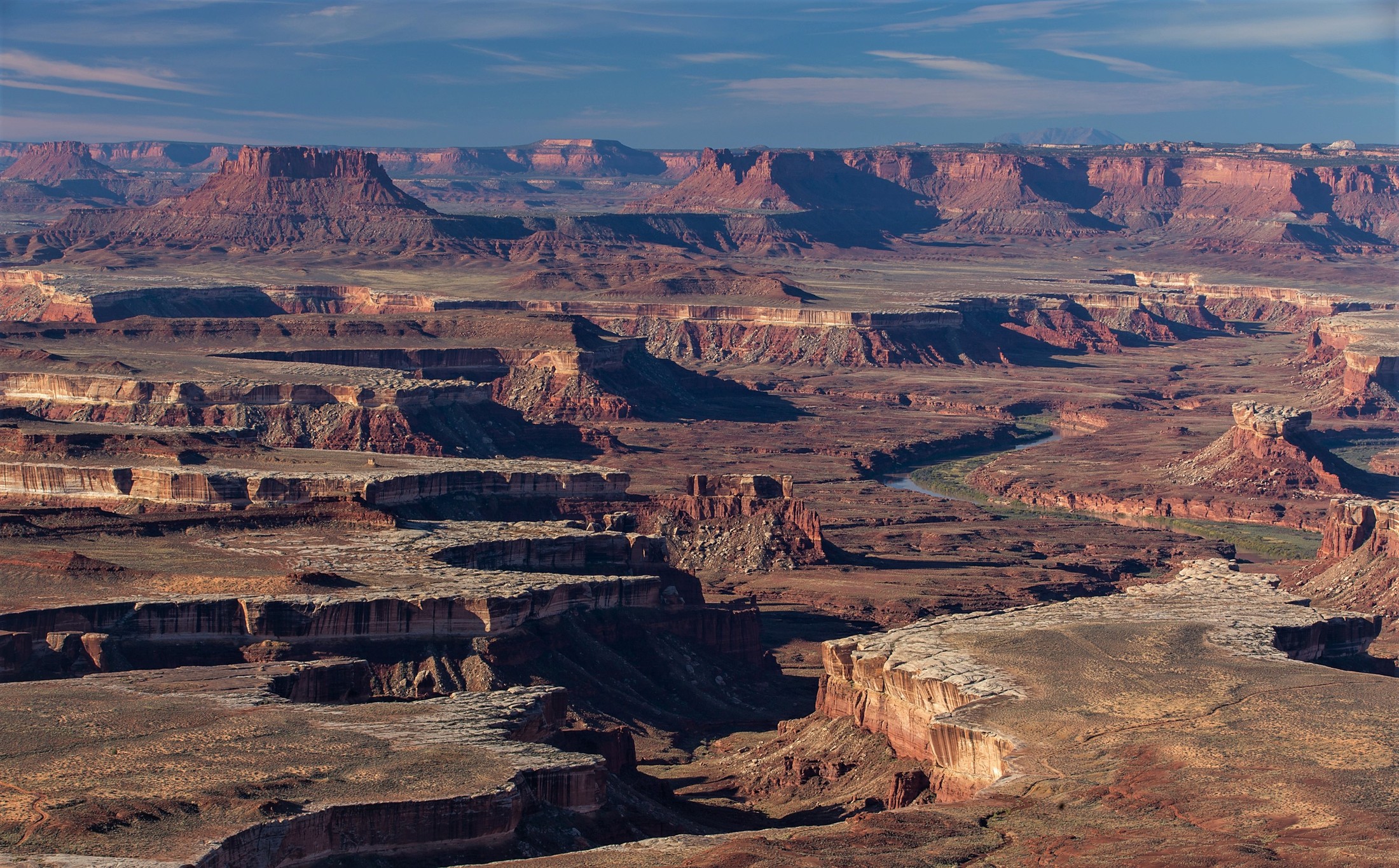 Green River Overlook, one of the few spots at Island in the Sky where you can actually see the river, the canyons are that deep!  Ekker Butte upper left, Turks Head (right). | Canyonlands National Park in United States